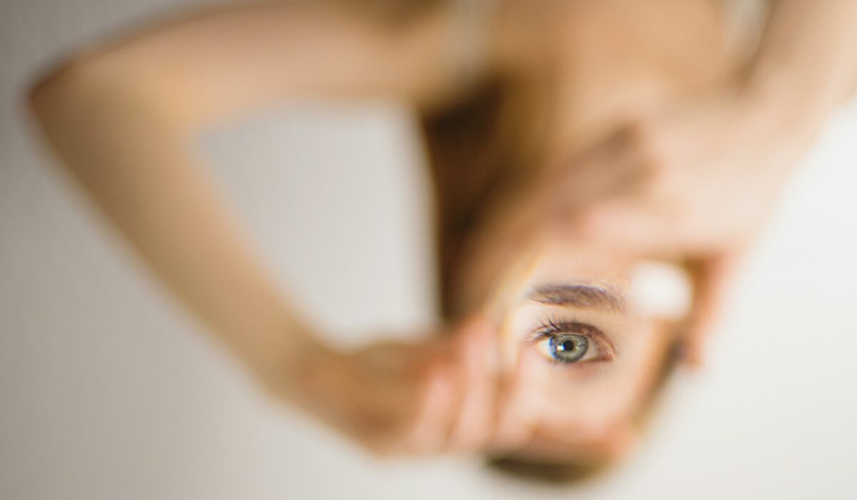 woman holding mirror